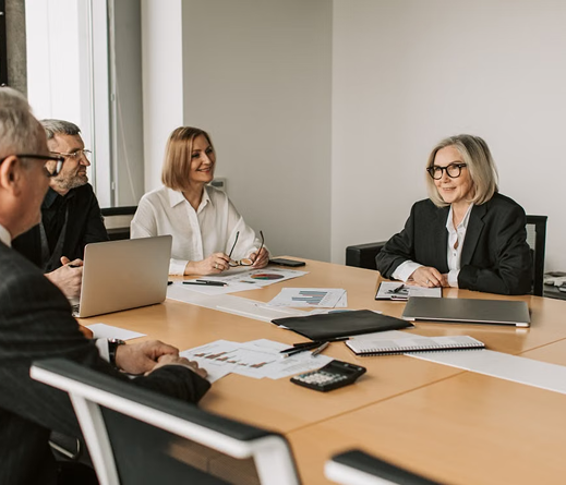 Professionals meeting around a boardroom table