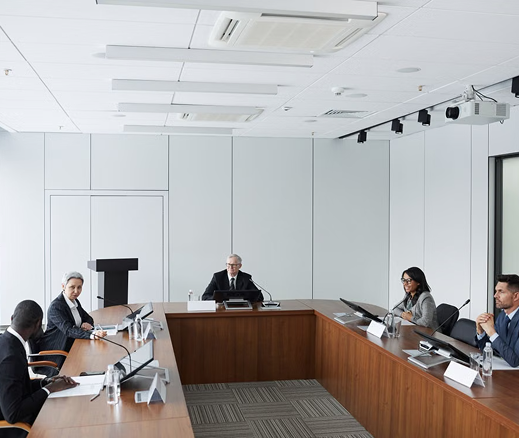 Nonprofit board meeting in a courtroom